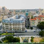 imagine cu palatul universității din bucurești fotografiat din teatrul național
