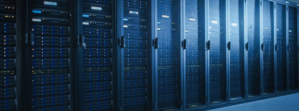Shot,Of,Modern,Data,Center,With,Multiple,Rows,Of,Fully
